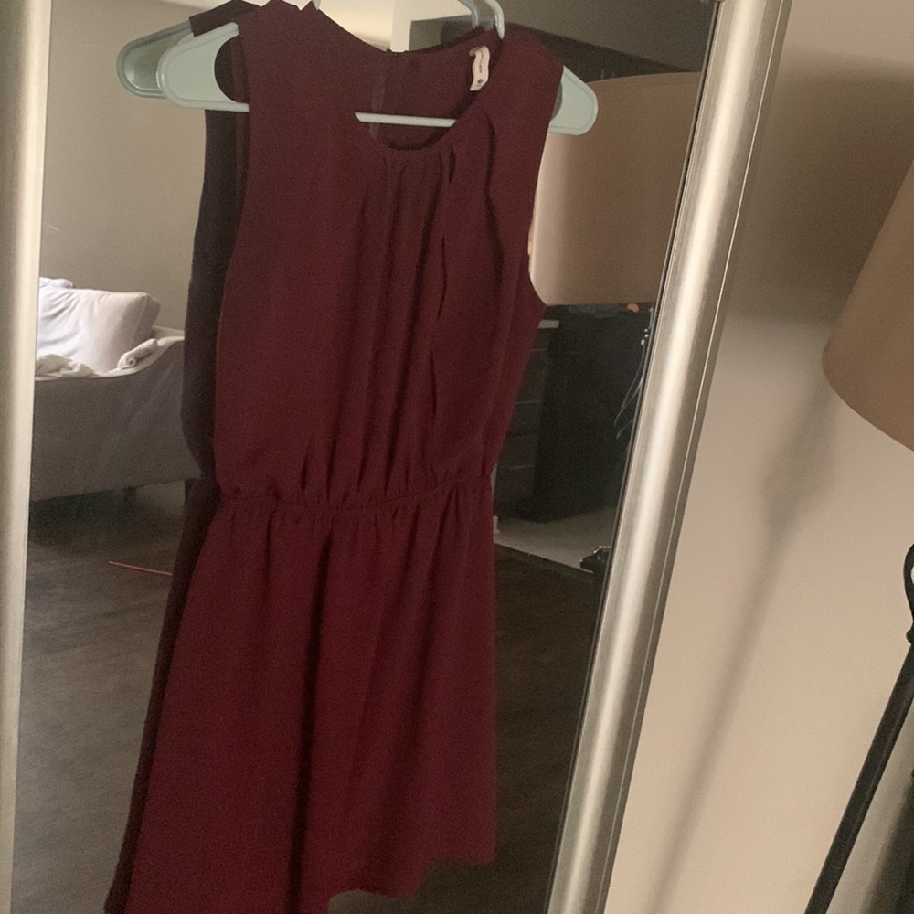 Maroon mini dress with copper button clasp in back. Fits as small!